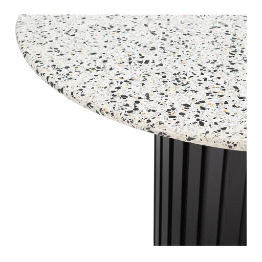 Terrazzo round dining table with linear slatted black oak base.